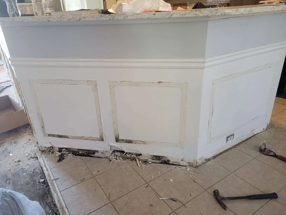 Water damage and mold on kitchen during Storm Damage Restoration in Prosper